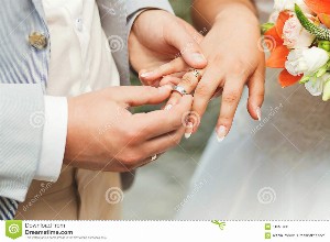 groom-wearing-ring-hand-bride-nature-61651431_1578163342.jpg